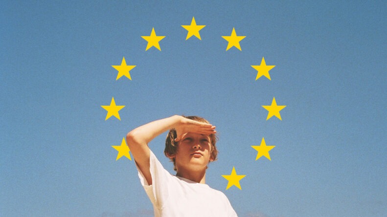 Youth Guarantee Cover - Young person looking far into the distance, the sky with the eu stars behind him